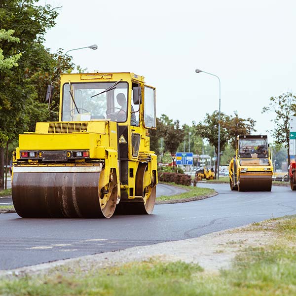 2 road rollers paving the road